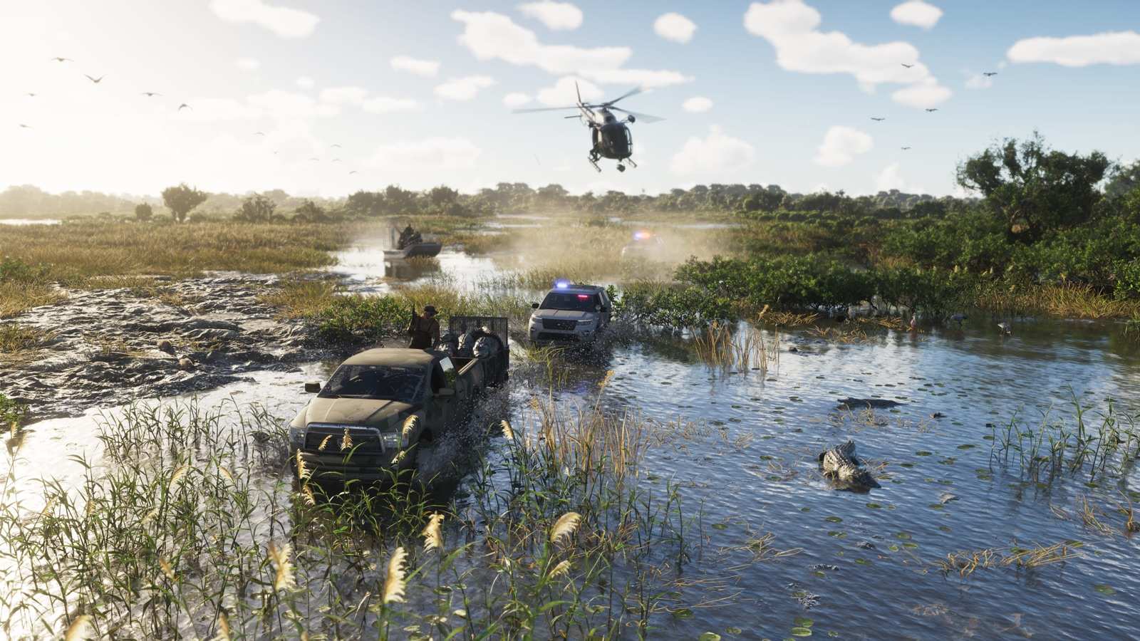 A police helicopter and cruisers chasing a pickup through a Grassrivers swamp