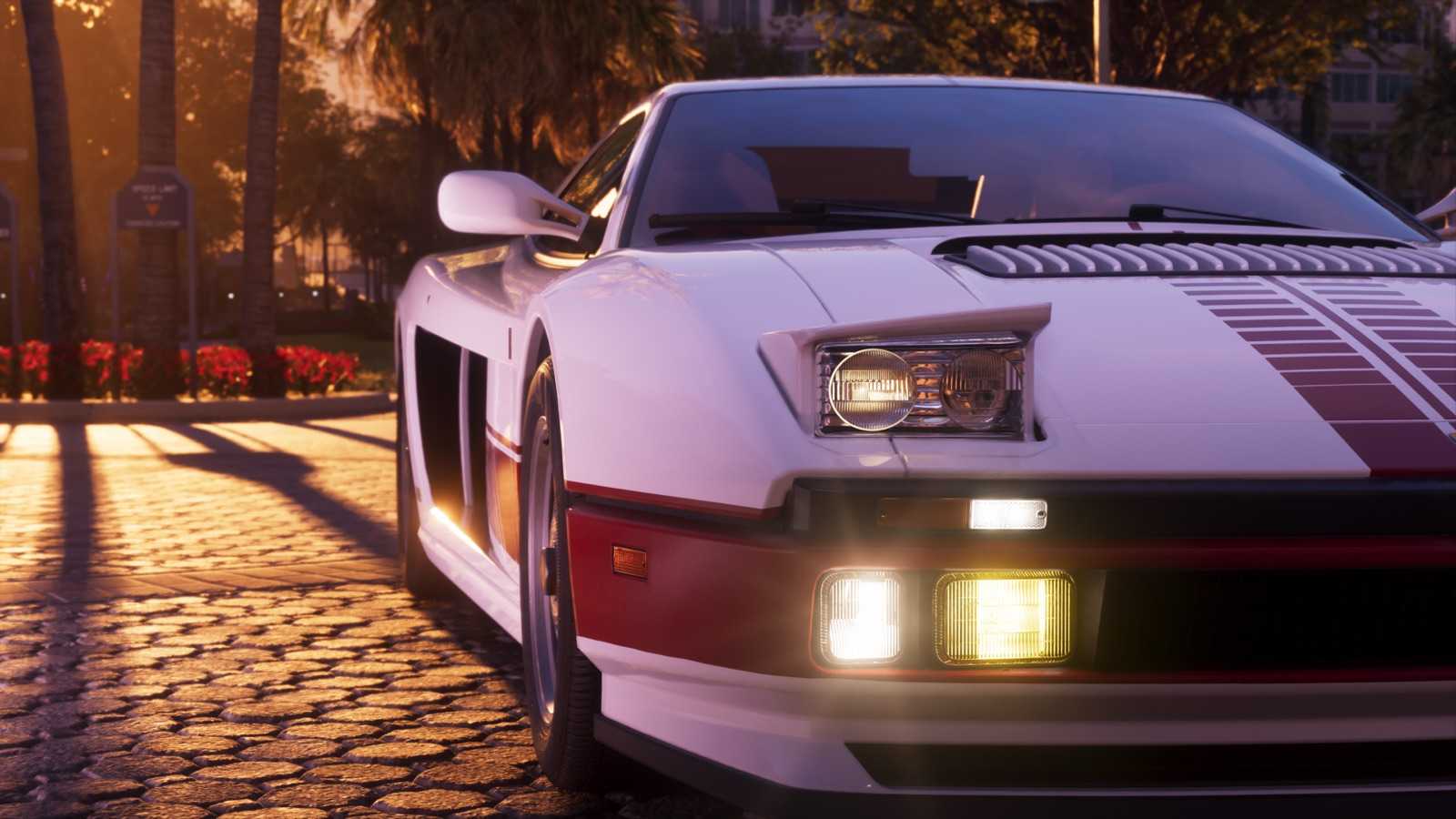 Front of the white '95 Grotti Cheetah with its pop-up headlights on