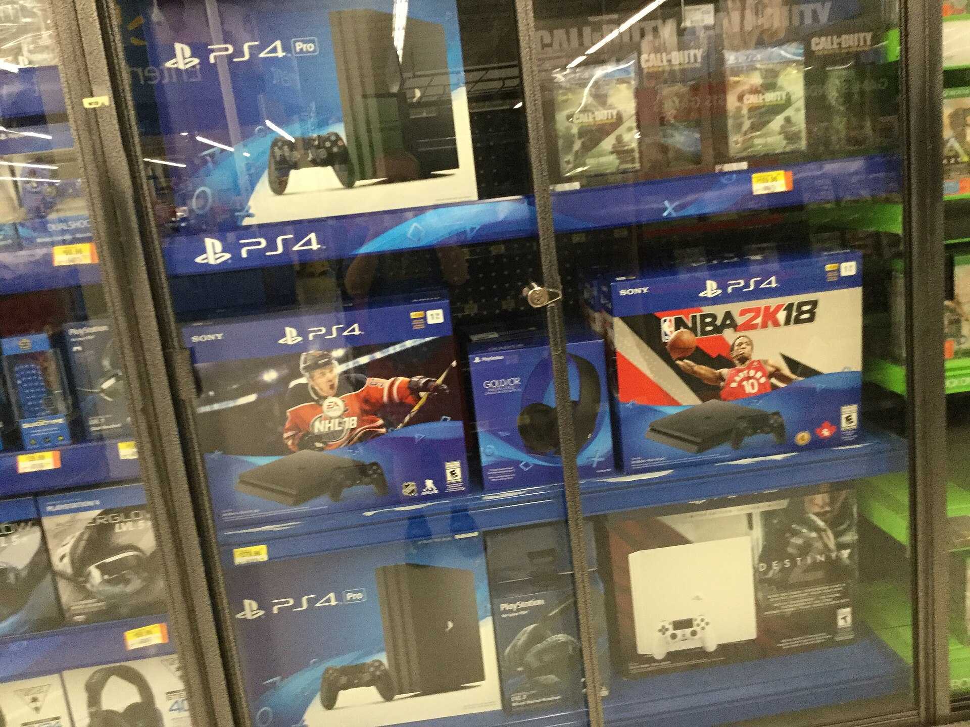 Video game consoles and games on store shelves